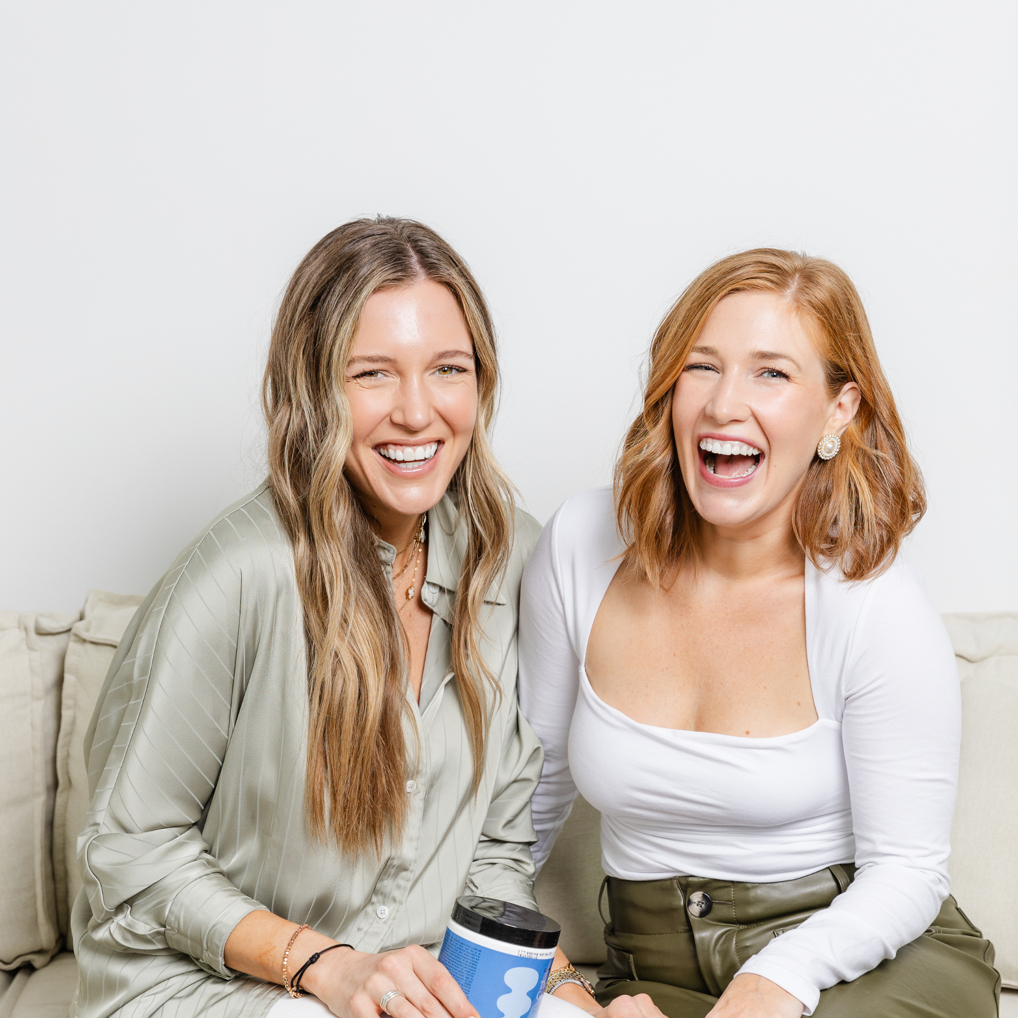 two women smiling on oouch