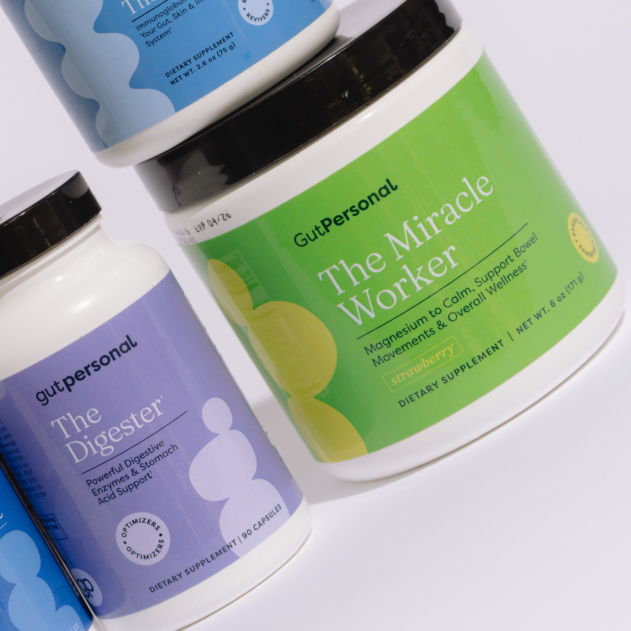 Two supplement bottles labeled 'The Digester' and 'The Miracle Worker' on a white background.