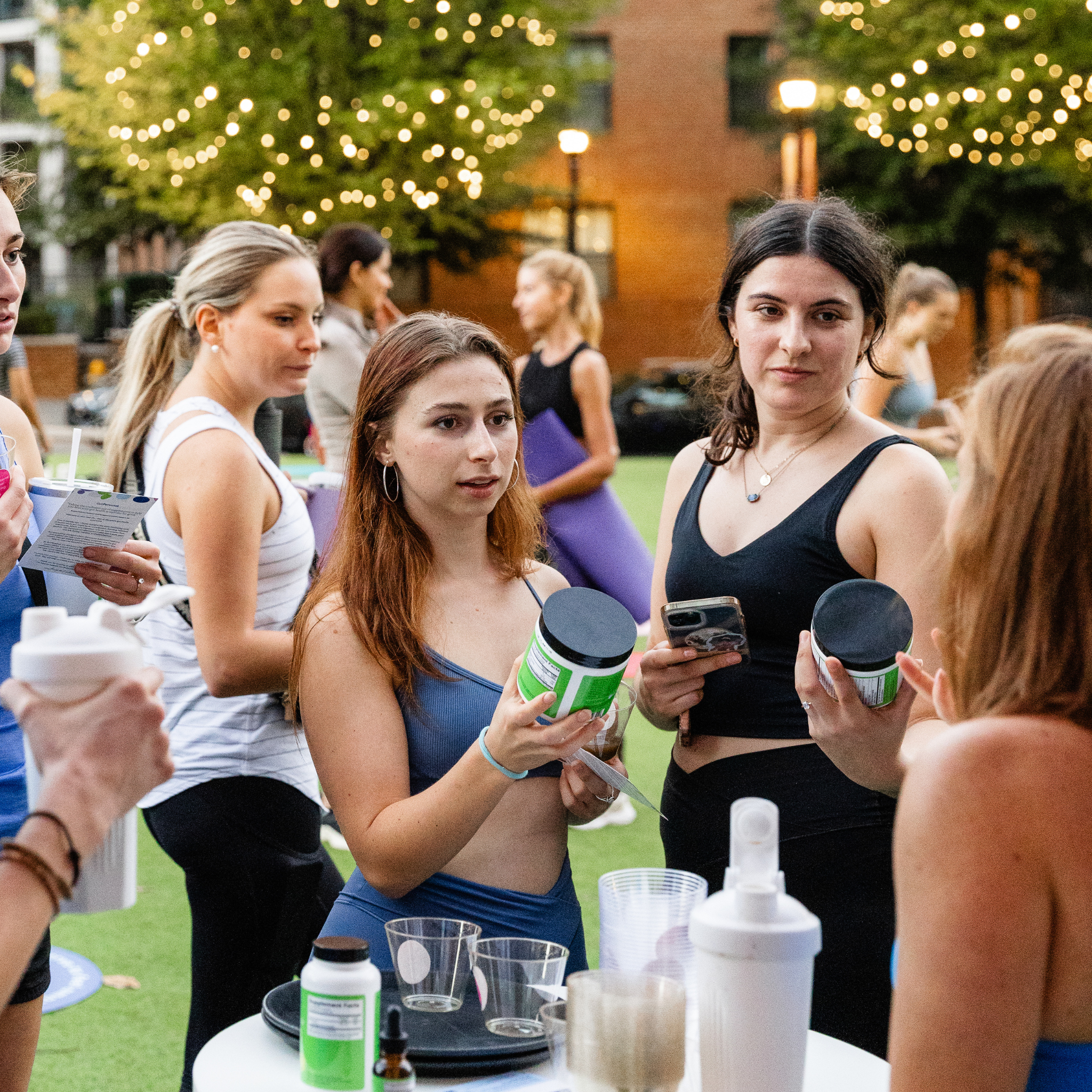 women talking outside about supplements
