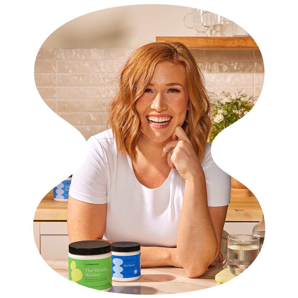 women in kitchen with gutpersonal supplements