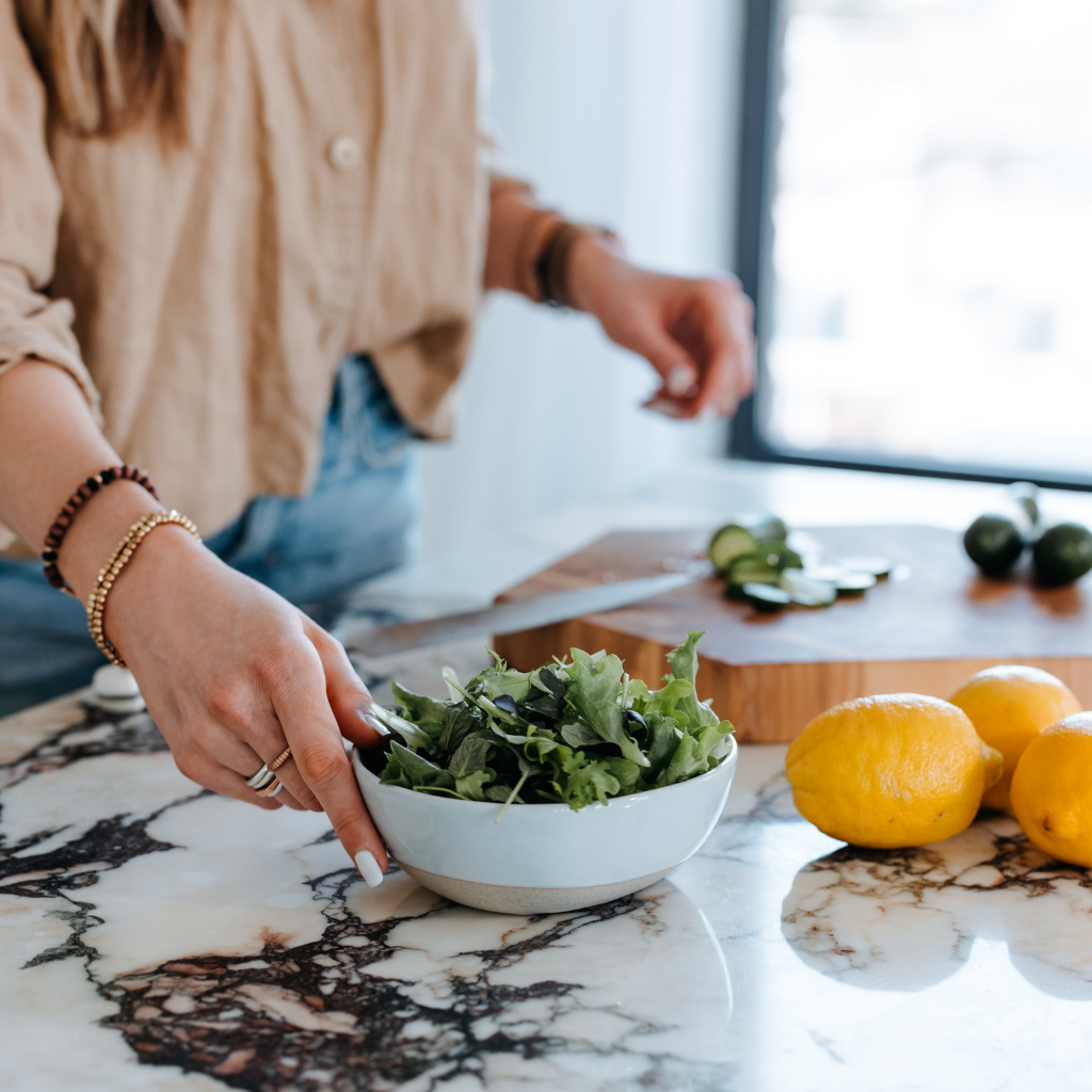 a women making a salad